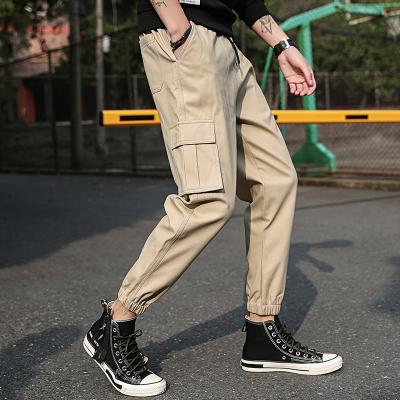 China Hot Selling Multi-pocket Solid Color Sports Fitness Men's Casual Loose Leg Cargo Wide Leg Pants Fashion Breathable Joggers for sale