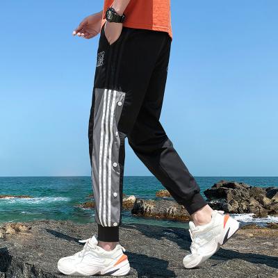 China Travel Breathable Outdoor Side Bars Long Sports Casual Work Track Loose Wide Leg Pants For Men for sale