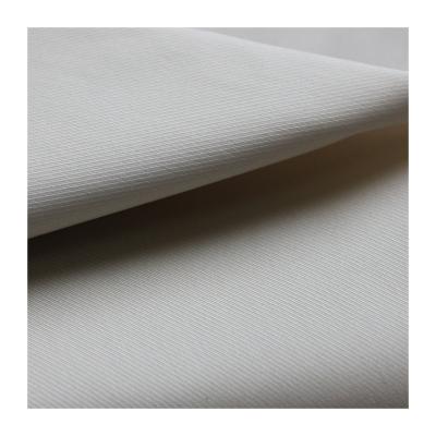 China Stretch New Arrival 65% Cotton 32% 3% Nylon Spandex Fabric For Garment Pants Fabric for sale