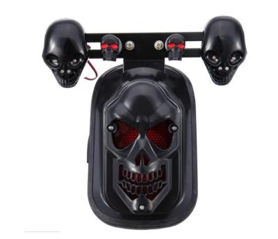 China Universal Black Motorcycle Skull Turn Signal Rear Brake Tail Light For Harley Bobber Honda Yamaha AB16 for sale