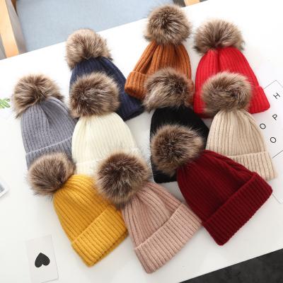 China JOINT children knitted pom beanie custom pom beanie quality logo simple warm winter hats for sale