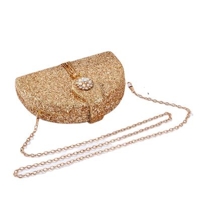 China Elegant appearance WAKED up factory direct sale glitter rhinestone pearl decoration opening and closing clutch bag for sale