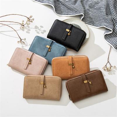 China Durable WAKE Custom Round Zipper Coin Pocket Card Slots Multi Bifold Short Wallet For Women for sale