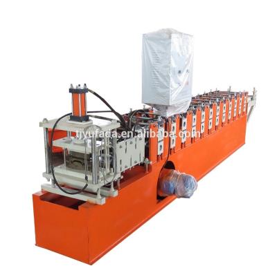 China Hotels Factory Supply Automatic Roller Shutter Slats Door Roll Forming Machine With Hole Punch for sale