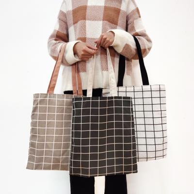 China Reclycled Classic Black White Square Checked Leisure Street Shopping Female Portable Shoulder Tote Bag Canvas Student for sale