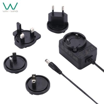 China Interchangeable PC and ABS Plug Power Adapter 5V 6V 9V 12V 15V 24V 0.5A 1A 2A 2.5A DC to AC Adapter UL62368 TUV-GS UKCA RCM for sale