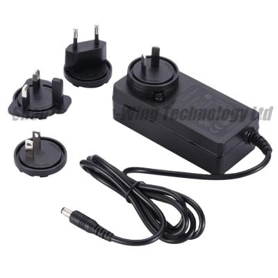 China Detachable UK PC+ABS Firepower Adapter 36w 9v 4a Plug Adapter Aus Eu Plug For Optional for sale