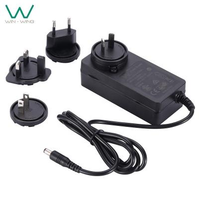 China ABS and PC AC DC Power Supply 24V 2.5A International Power Adapter with EU UK USA AUS Interchangeable Plug for sale