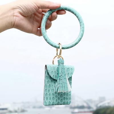 China Vintage AD. Wrist Wallet Crozzling Card Handmade Bag Key Ring Key Chain PU Leather Animal Key Chain Wallet For Women for sale