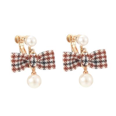 China FASHIONABLE Korean style sweet and cute black pearl bow pendant gold plated copper earrings for sale