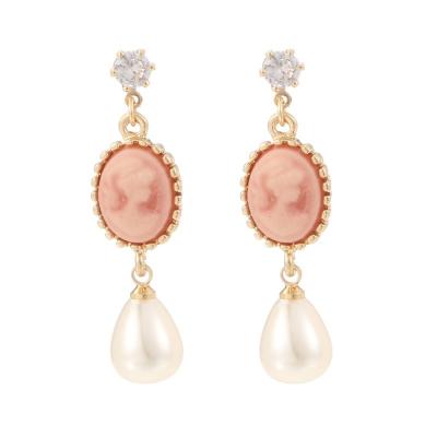 China 2022 Unique Design Pearl Earrings Fashionable Lolita Beauty Head Earrings High Quality Zinc Alloy Earrings for sale