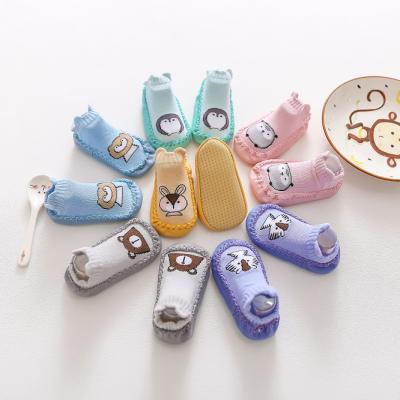 China Antibacterial Newborn Toddler Combed Cotton Cartoon Baby Non Slip Sole Kids Floor Shoes Rubber Socks for sale