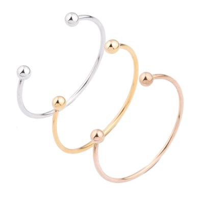 China Simple Environmentally Friendly Stainless Steel Rose Gold Mirror Polished Open Round Bead Cuff Bracelets For Women for sale