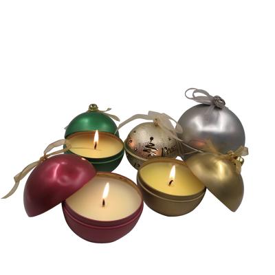 China Recycled materials colored metal candle jars round ball candle tin can metal aromatherapy candle box with ribbons and bells for sale