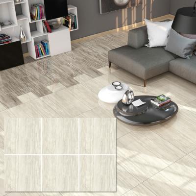 China Modern Foshan Hanse Polished Porcelain Tiles 600mm Cream Marfil Ceramic Floor Flooring for sale