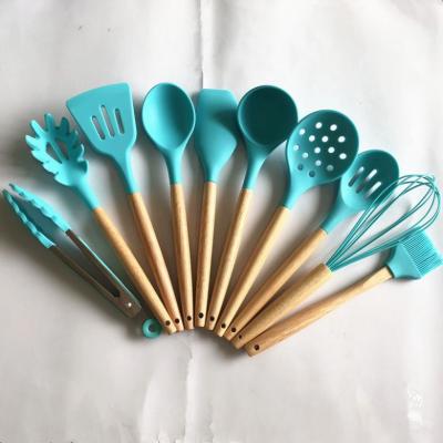 China OEM Products Sustainable Hot Selling Cookware Kitchen Silicone Cookware Set Cookware With Wooden Handle for sale