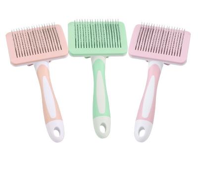 China Stored Dog and Cat Hair One Key Remove Hair Comb Pet Massage Throwing Remover Grooming Pet Hair Brush for sale