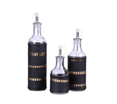 China Round glass bottle of cooking oil with cap for sale