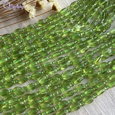 China Hot sale online loose peridot product export polishing natural volume tumbled stones for making jewelry for sale