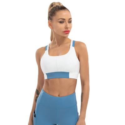 China Women Breathable Fitness Crop Tops Strappy Breathable Sports Bra Cross Back Yoga Gym Bra for sale