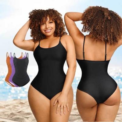 China HEXIN Mujeres personalizadas huecas ropa de playa sexy bikini traje de baño con envío rápido en venta