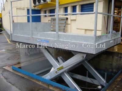 China High Load Capacity Insulating 4-6 Ton Marco Loading Dock Scissor Lift Table with CE Approved Driven by Hydraulic for sale