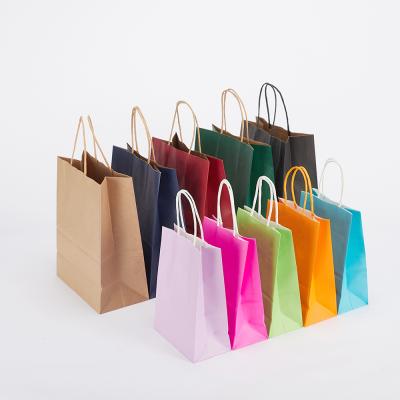 China Recycled Materials Ruthbag Custom Printed Your Own Logo White Brown Kraft Gift Craft Christmas Shopping Paper Bag With Handles for sale