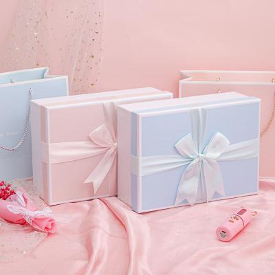 China Recycled Materials Wholesale Eco - Friendly Packaging Gift Box With Ribbon Design Gift Box Present Custom Gift for sale