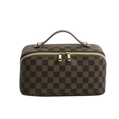 China New Style Preppy Style Small Handbags For Sense Women Cosmetics Toiletry Bag Luxury Top Plaid Storage Bag Portable Large Capacity Bag for sale