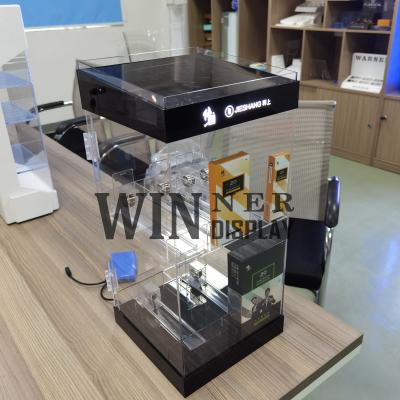 China Custom Design Fashion Design Custom Design Acrylic Disposable E-Liquid Display Racks Small Counter E-cig Holder With Lockable Door for sale