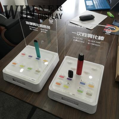 China 2021 eco-friendly design retail countertop perspex perspex cigarette holder e cigarette customized acrylic liquid display stand for sale