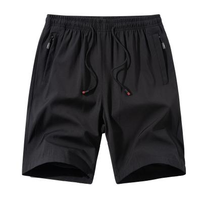 China Summer Straight Casual Ice Shorts Solid Color Shorts Youth Work Jogger Pants Beach Silk Shorts QUICK DRY Elastic Five Points for sale