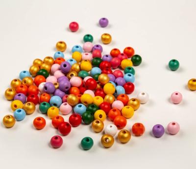 China Wood 16mm Colored Beads Bulk DIY Necklace Wooden Garlands Accessories for sale