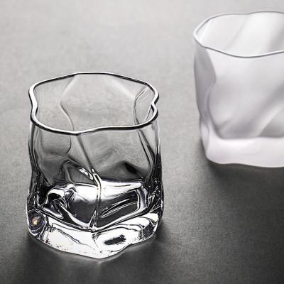 China Viable Good Quality Beer Glass Mug Whiskey Mug Irregular Twist Shaped Glass Mug Transparent Glass Cup for sale