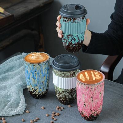 China Viable Reactive Glazed Ceramic Insulated Reusable Coffee Cup Travel Mug Travel Mug With Silicone Insulation Cover And Lid for sale