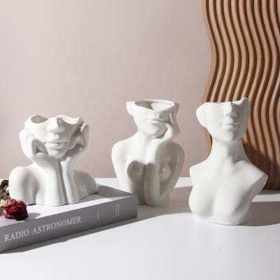 China Modern Hot Selling Ceramic Human Elegant Female Head Vase Ceramic Body Modern Home Decorative Female Flower Vase White for sale