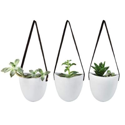 China Modern Indoor Outdoor Modern White Porcelain Basket Planter Flower Pots Ceramic Hanging Planter Pot Set of 3 for sale