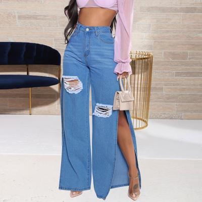 China Fashion washable side slit denim pants for ladies high waist ripped jeans women flare leg pants for sale