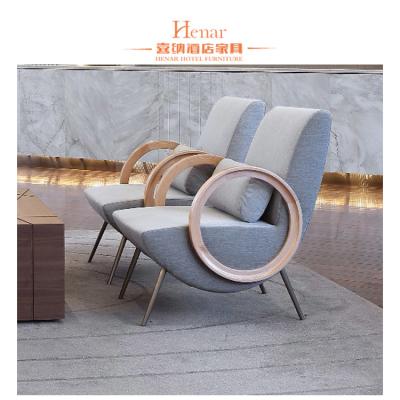 China Fashionable Leisure Hotel Lobby Sofa / Wooden Lounge Chair Fabric Upholstery Seat for sale