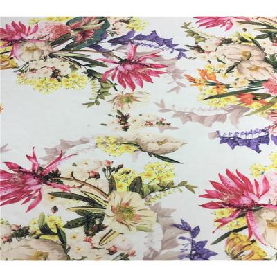 China 2019 simply colorful flower knitted 96%poly4%sp ity fabric for garment lady's dress skirt for sale