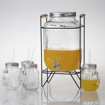 China Eco-Friendly Wholesale Clear Glass Food Grade Beverage Dispenser And Glass Mason Jar With Metal Stand And Tap for sale