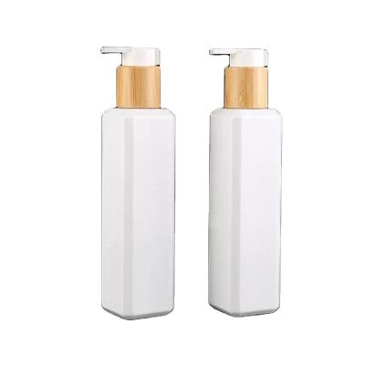 China Personal Care 250ml Bamboo Pet Square Lotion Bottle With Bamboo Pump To Go Container With Lid for sale