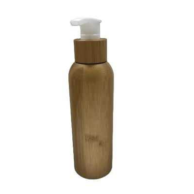 China Personal Care 50ml 100ml 120ml Round Lotion Engrave Cosmetic Bamboo Full Cover With Plastic Inner Pump And Transparent Cap Bamboo Bottle for sale