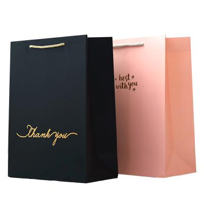 China Recycled Materials Custom Logo Printed Shopping Gift Recycled Pink Kraft Paper Bag With Handle For Jewelry for sale