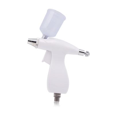 China 20cc 40cc Mini 20cc 40cc Mini 20cc 40cc Beauty Spa Skin Care Airbrush Spray Gun Pneumatic Facial Tanning Gun for sale