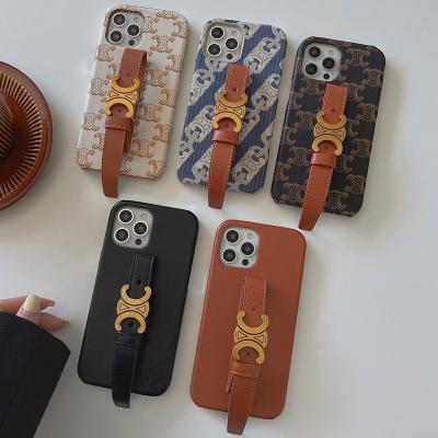 China Designer Shockproof Branded Phone Case For Luxury iPhone 13 With Wrist Strap for sale