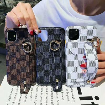 China Lattice Grain Card Slot Wristband Design PC+PU Luxury Shockproof Shockproof Phone Case for iphone 13 13 pro max for sale