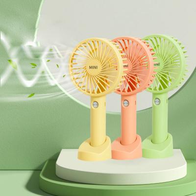 China Handheld / Desktop Multi function plastic portable electric battery usb rechargeable mobile cooling hand held mini fan for sale