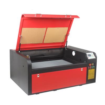 China Laser Engraving Laser Cutting Engraving Machine CO2 CNC 6090 With 100W Laser Tube for sale