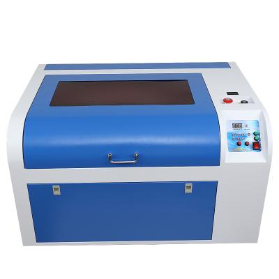 China Laser Engraving Small Laser Cutting Engraving Machine 4060 50W 60W For Nonmetals With Competitive Price for sale